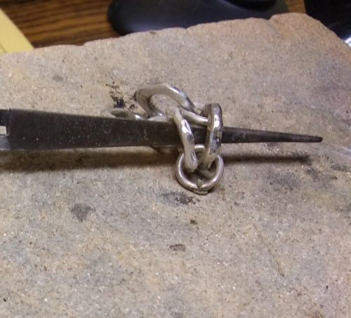 Judy Larson's Argentium Silver Scrap Chain - , Contemporary Wire Jewelry, Making Chain, Chain Making , Butane Torch, Soldering, Solder, Position the tweezers so the jump ring seam touches the flat soldering surface.